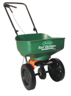 1. Green Turf Builder spreader for lawn and garden maintenance.