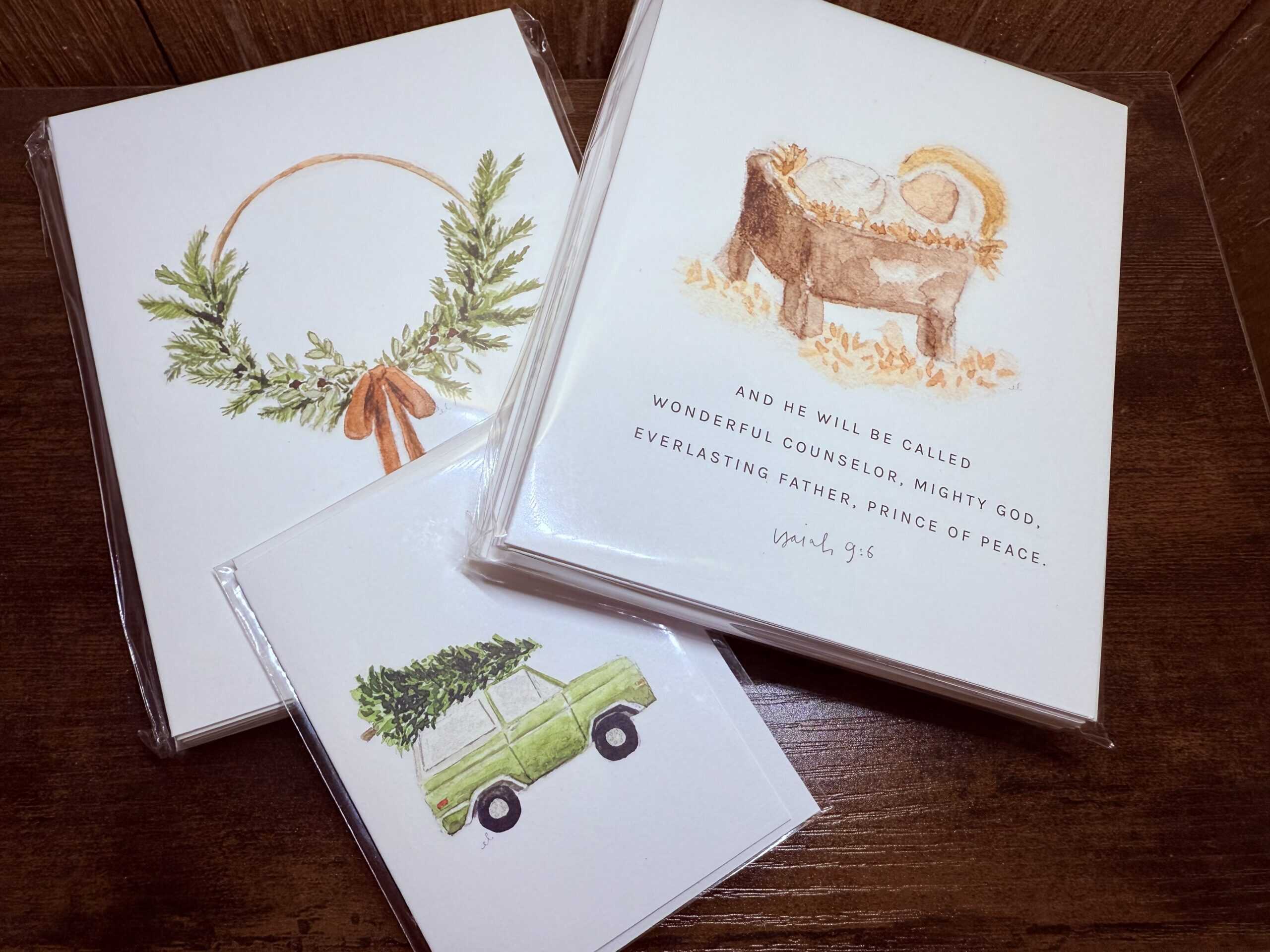 Wreath and Christmas cards featuring festive watercolor illustrations for holiday greeting cards.