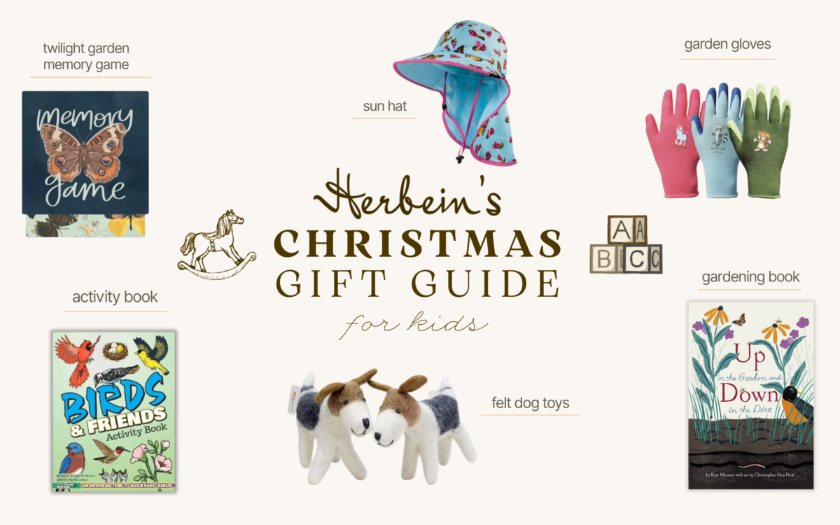 Colorful children's garden gloves, sun hat, and fun plush felt dog toys at Herbein's Garden Center.