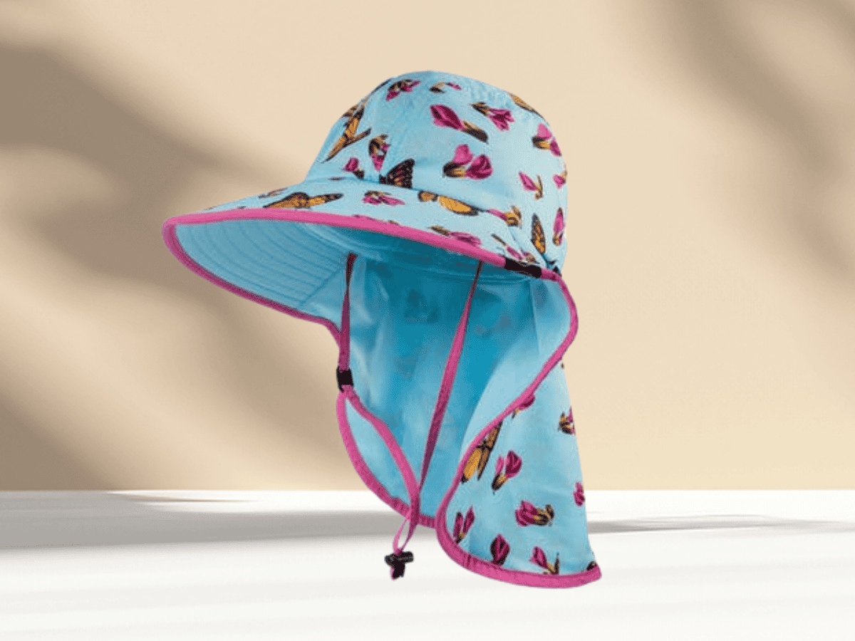 Bright blue children's sun hat with butterfly pattern for outdoor shade.