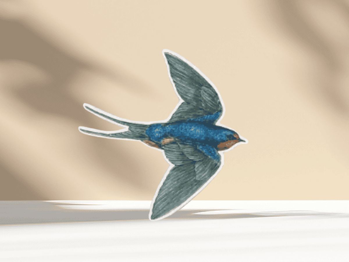 Detailed glass swallow bird ornament for garden or outdoor decor, adds charm to your landscape design.